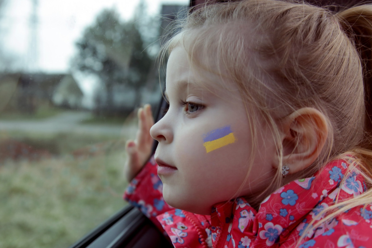Portrait of little girl with Ukraine flag painted on her face sitting in the car. Refugees, war crisis, humanitarian disaster concept.
2134078359
photos purchased from Shutterstock, can be used freely