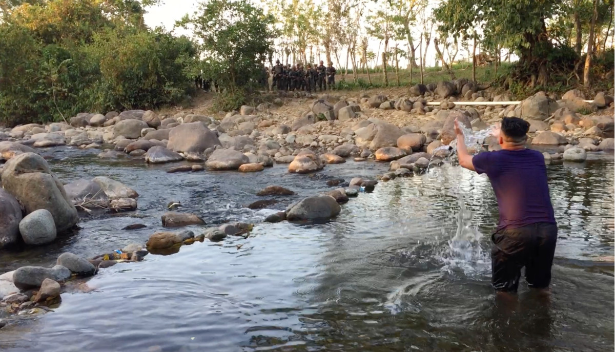 The Guapinol community (children, elders etc) and the delegates with Honduras Root Causes 2019 at the Guapinol River. On the other side of the river are the mining interests and the Honduran army with machine guns. Water Is Life.
https://www.flickr.com/p